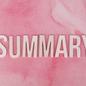 summary text on a pink surface